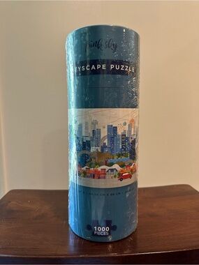 Pink Sky • 1,000 piece puzzle •’contained in a large canister • citiscape